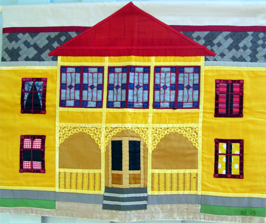 Huset med glasverandan,  applikation av textilkonstnr katrin bawah