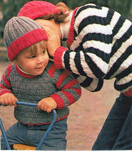 Tjock m�nstersticka tr�ja med randiga �rmar eller helt randig